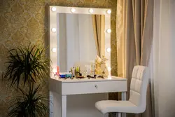 Mirror with light in the bedroom photo