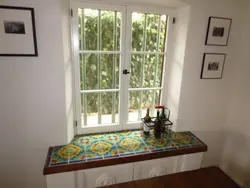 Window sill made of tiles in the kitchen photo