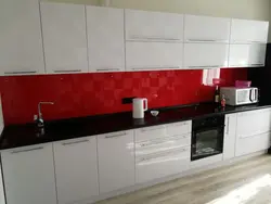 White kitchens with red countertops photo