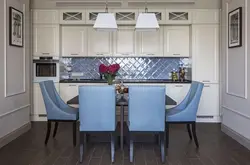 Gray kitchen with blue chairs photo