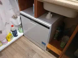Ас үйдегі ыдыс жуғыш машинаның шағын фотосуреті