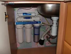 Water filter in the kitchen photo
