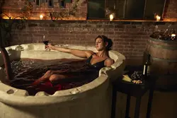 In the bath with a glass of wine photo