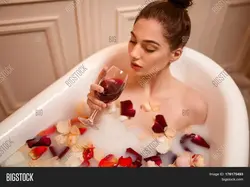 In The Bath With A Glass Of Wine Photo