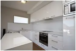 Handles On A White Glossy Kitchen Photo