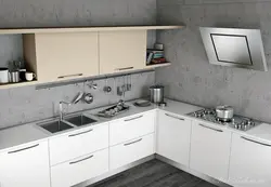Handles on a white glossy kitchen photo