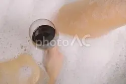 Bath with foam and wine photo