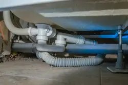 How to connect a bathtub to the sewer photo