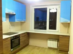 Pencil case near the window in the kitchen photo