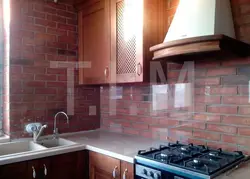 Stove Against The Wall In The Kitchen Photo
