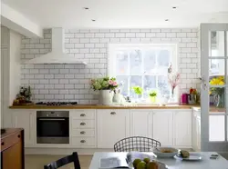 Stove against the wall in the kitchen photo