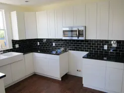 Photo Of Black And White Tiles In The Kitchen