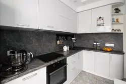 Gray kitchen with marble countertop photo