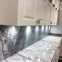 Gray kitchen with marble countertop photo