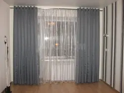 Qonaq otağının fotosunda göz qapaqlarında tül