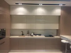 Kitchen up to the ceiling without handles photo