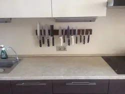 Magnet for knives photo in the kitchen
