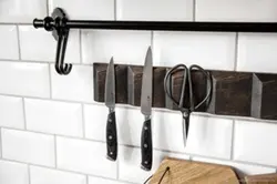 Magnet for knives photo in the kitchen