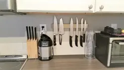 Magnet for knives photo in the kitchen