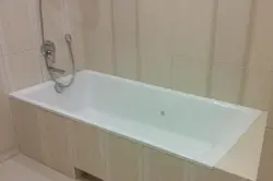 Bathroom in a tile box photo