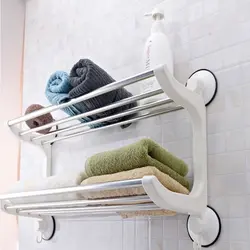 Bathroom shelf for towels photo