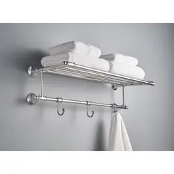 Bathroom shelf for towels photo