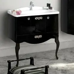 Sink with legs in the bathroom photo
