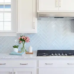 Herringbone tiles for kitchen backsplash photo