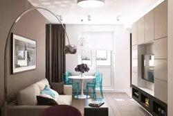 Үш бөлмелі пәтердегі ас үйдегі қонақ бөлмесінің фотосуреті