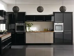 Black appliances in a beige kitchen photo