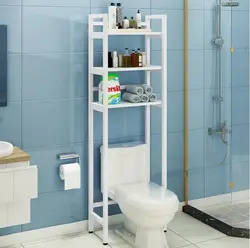 Shelf in the bathroom above the toilet photo