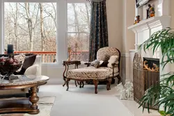 Armchairs by the window in the living room photo