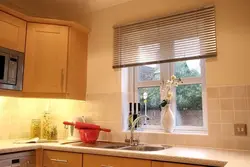 Curtains on blinds for the kitchen photo