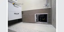 Люк дар зери ванна дар зери сафолҳои акс