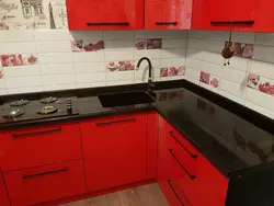 Photo of a kitchen with a red countertop photo