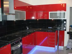 Photo Of A Kitchen With A Red Countertop Photo