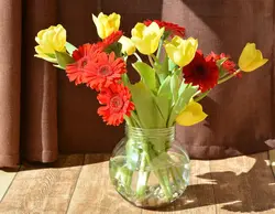 Flowers in the kitchen in a vase photo