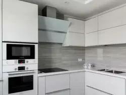 Photo Of White Kitchen With Gray Appliances