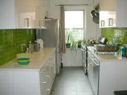 White kitchens with green apron photo