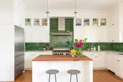 White kitchens with green apron photo