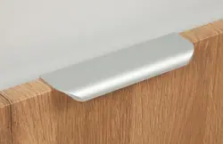 Overhead handle for kitchen facade photo