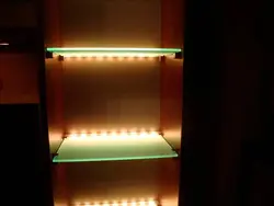 Photo of illuminated shelves in the kitchen