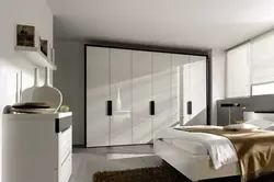 White glossy bedroom wardrobe photo