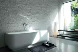 Plaster Under Tiles In The Bathroom Photo