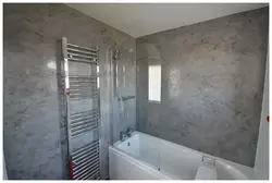 Plaster under tiles in the bathroom photo
