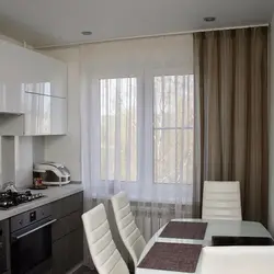 Curtains in the kitchen above the countertop photo