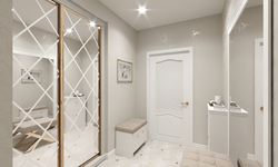 White mirrored wardrobe in the hallway photo