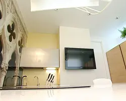 Kitchen hood with TV photo