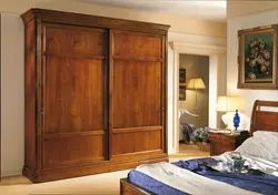 Wood-effect wardrobe in the bedroom photo