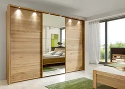 Wood-effect wardrobe in the bedroom photo